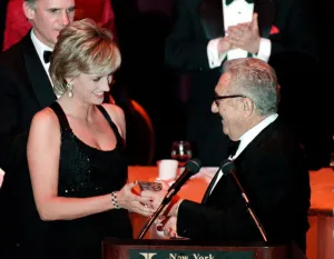 Princess Diana wears a black evening dress whilst receiving an award in New York Princess Diana wears a black evening dress whilst receiving an award in New York