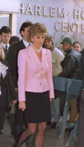 Princess Diana wears pink jacket and black skirt during a visit to Harlem Princess Diana wears pink jacket and black skirt during a visit to Harlem