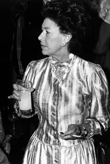 Princess Margaret smoking with cigarette holder and drinking orange at the Pye TV awards Princess Margaret smoking with cigarette holder and drinking orange at the Pye TV awards