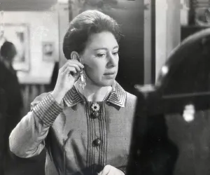 Princess Margaret tries on new earrings Valued at £ Princess Margaret tries on new earrings Valued at £