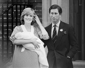 Princess of Wales holds her new born baby son William and Prince Charles at St Princess of Wales holds her new born baby son William and Prince Charles at St
