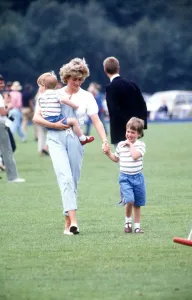 Princess of Wales with Prince Harry and Prince William during a polo match at Smith' Princess of Wales with Prince Harry and Prince William during a polo match at Smith'