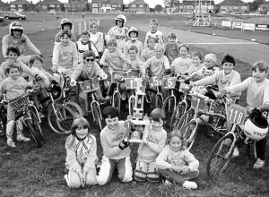 Proud as punch - these TV star BMX riders show off their latest trophy. 20th August 1986 Proud as punch - these TV star BMX riders show off their latest trophy. 20th August 1986