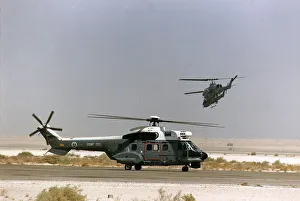 A Puma helicopter awaits clearence for take off from a Saudi airfield located in A Puma helicopter awaits clearence for take off from a Saudi airfield located in