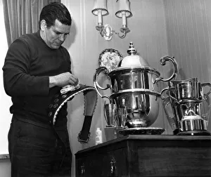 Putting a shine on one of his trophies is British wrestler Count Bartelli in his Crewe Putting a shine on one of his trophies is British wrestler Count Bartelli in his Crewe