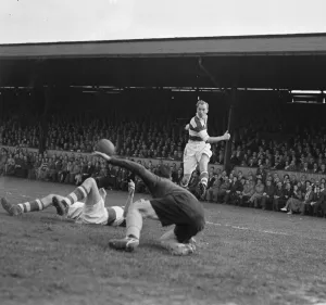 QPR striker seen here in a goal mouth melee, tries an attempt on goal QPR striker seen here in a goal mouth melee, tries an attempt on goal