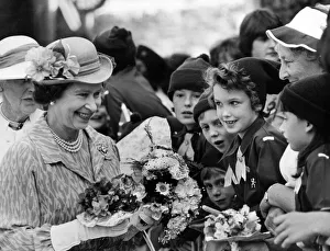 The Queen brings delight to the faces of Brownies who greeted her in Brecon ahead of her The Queen brings delight to the faces of Brownies who greeted her in Brecon ahead of her