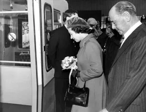 Queen Elizabeth II and Prince Philip board the Metro Train at Gateshead station to leave Queen Elizabeth II and Prince Philip board the Metro Train at Gateshead station to leave