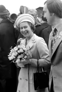 Queen Elizabeth II rocked with laughter at Pepys Estate, Deptford, today Queen Elizabeth II rocked with laughter at Pepys Estate, Deptford, today