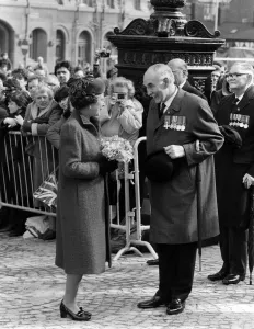 Queen Elizabeth II visits the G-Mex Centre Manchester. The Queen chats with a group of Queen Elizabeth II visits the G-Mex Centre Manchester. The Queen chats with a group of