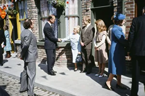 Queen Elizabeth & Prince Philip visit the set of Coronation Street in the fictional town Queen Elizabeth & Prince Philip visit the set of Coronation Street in the fictional town