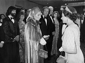 The Queen meeting Barbra Streisand watched by James Caan The Queen meeting Barbra Streisand watched by James Caan