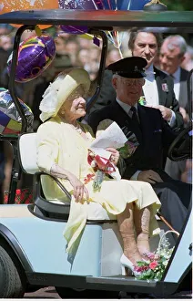 The Queen Mother rides in her buggy outside Clarence House as Britain' The Queen Mother rides in her buggy outside Clarence House as Britain'