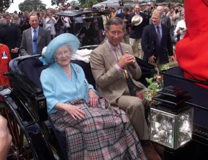The Queen Mother at the Sandringham Flower Show 1999 riding in carriage with Prince The Queen Mother at the Sandringham Flower Show 1999 riding in carriage with Prince