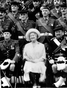 Queen Mother sitting with soldiers of the 1st Battalion 51st Highland Volunteers Queen Mother sitting with soldiers of the 1st Battalion 51st Highland Volunteers