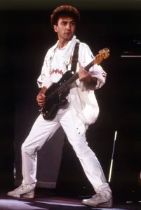 Queen Rock Group John Deacon playing bass guitar Queen in concert at Wembley Queen Rock Group John Deacon playing bass guitar Queen in concert at Wembley