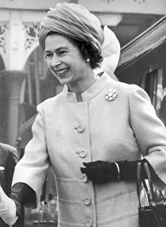 The Queen steps smiling from the Royal Train at Victoria Station The Queen steps smiling from the Royal Train at Victoria Station
