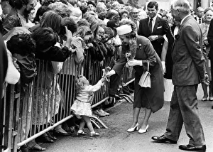 One of the Queen's tinier subjects hands over a posy in Welshpool. 12th July 1986 One of the Queen's tinier subjects hands over a posy in Welshpool. 12th July 1986