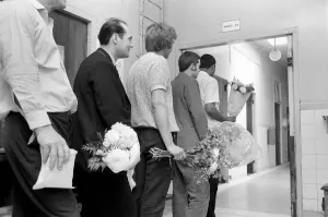Queueing up outside ward 4 at the Mile End Hospital, London the men wait to visit their Queueing up outside ward 4 at the Mile End Hospital, London the men wait to visit their