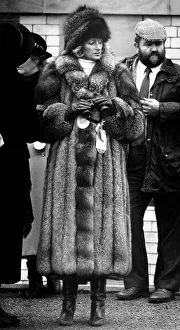 A race goer at Aintree Racecourse, Liverpool, Merseyside. 6th April 1989 A race goer at Aintree Racecourse, Liverpool, Merseyside. 6th April 1989