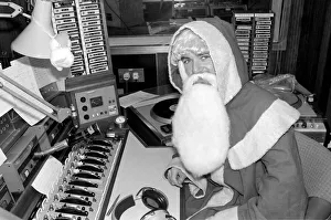 Radio One Disc Jockey Noel Edmonds dressed as Father Christmas on his breakfast show Radio One Disc Jockey Noel Edmonds dressed as Father Christmas on his breakfast show