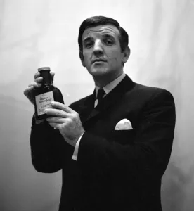 Radio DJ Alan Freeman holding a bottle of Mersey water February 1964 Radio DJ Alan Freeman holding a bottle of Mersey water February 1964