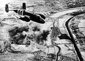 An RAF Mitchell B25 bombs the steel works in Caen Normandy An RAF Mitchell B25 bombs the steel works in Caen Normandy