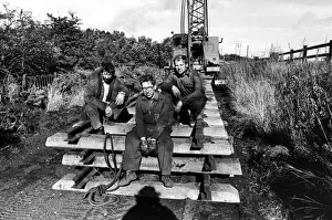 Railway enthusiasts Derek Cowan, Eric Maxwell and Neil Morgan taking a break from track Railway enthusiasts Derek Cowan, Eric Maxwell and Neil Morgan taking a break from track