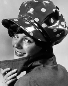 A rain hat worn by model Becky called Wig hats made by Topsy Creations October A rain hat worn by model Becky called Wig hats made by Topsy Creations October