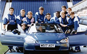 The Rangers first team try out a Honda for size at the launch of the £ The Rangers first team try out a Honda for size at the launch of the £