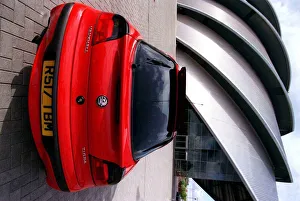 Red Vauxhall Tigra car May 1998 rear view outside Clyde Concert Hall Armadillo Red Vauxhall Tigra car May 1998 rear view outside Clyde Concert Hall Armadillo