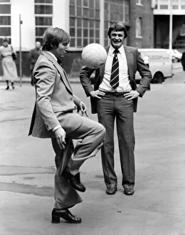 Reg Bowden-watched by Fulham centre Mal Aspey-knows his soccer. November 1980 P003657 Reg Bowden-watched by Fulham centre Mal Aspey-knows his soccer. November 1980 P003657