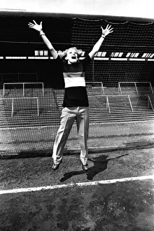Reporter Claire models clothes for sale from footballer Malcolm MacDonald' Reporter Claire models clothes for sale from footballer Malcolm MacDonald'