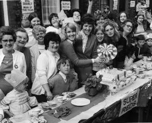 Residents of Paley Street, Anfield, cut a cake to celebrate Liverpool's F.A Residents of Paley Street, Anfield, cut a cake to celebrate Liverpool's F.A