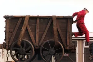 Restoration engineer Grodon Stark is helping to move an anciet wagon at the Stephenson Restoration engineer Grodon Stark is helping to move an anciet wagon at the Stephenson