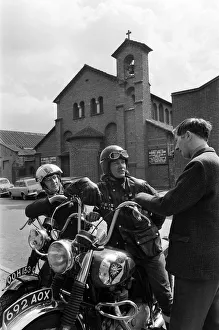 The Rev. Les Milner talking with members Raymond Fox (right The Rev. Les Milner talking with members Raymond Fox (right
