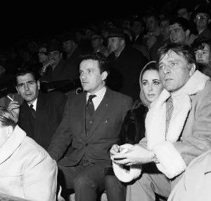 Richard Burton and Elizabeth Taylor watching a Rugby Match. 15th January 1965 Richard Burton and Elizabeth Taylor watching a Rugby Match. 15th January 1965