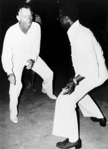 Richard Burton on the floor in Tshipisei at a birhday party in Oct 1977 Richard Burton on the floor in Tshipisei at a birhday party in Oct 1977