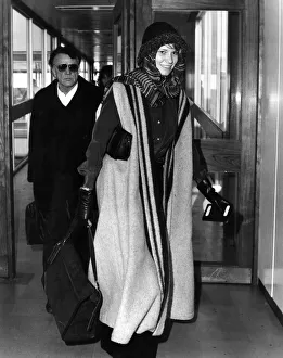 Richard Burton and his wife Suzy left London today for Geneva Richard Burton and his wife Suzy left London today for Geneva