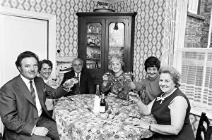 Richard Burton's family at home with a picture of him Richard Burton's family at home with a picture of him