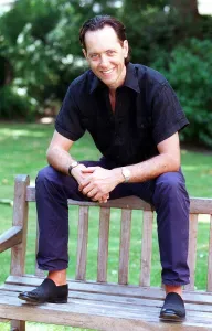 Richard E Grant sitting on a bench August 1998 SOON TO APPEAR IN BBC TV'S ' Richard E Grant sitting on a bench August 1998 SOON TO APPEAR IN BBC TV'S '