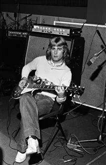 Rick Parfitt, lead guitar in the rock group Status Quo, rehearses in the studio Rick Parfitt, lead guitar in the rock group Status Quo, rehearses in the studio