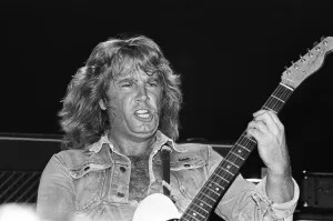 Rick Parfitt of rock group Status Quo, in concert in Vienna, Austria. 8th May 1986 Rick Parfitt of rock group Status Quo, in concert in Vienna, Austria. 8th May 1986