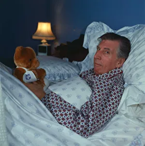 Ricky Fulton in bed with Teddy Bear comedian actor October 1987 Ricky Fulton in bed with Teddy Bear comedian actor October 1987