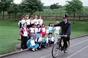 You put your right arm out... Pc David Wetton shows pupils at Lowerhouses C of E Junior You put your right arm out... Pc David Wetton shows pupils at Lowerhouses C of E Junior
