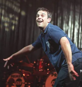 Robbie Williams dances at his concert at the SECC Glasgow February 1999 Robbie Williams dances at his concert at the SECC Glasgow February 1999