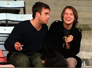 Robbie Williams and Mark Owen back together for a charity football match at Fulham FC Robbie Williams and Mark Owen back together for a charity football match at Fulham FC