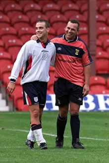 Robbie Williams playing football November 1999 wearing a England kit for the first half Robbie Williams playing football November 1999 wearing a England kit for the first half