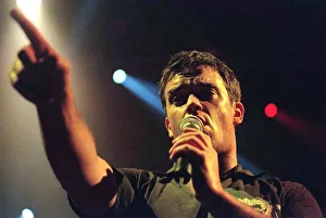 Robbie Williams sings at his concert in Aberdeen. February 1999 Robbie Williams sings at his concert in Aberdeen. February 1999