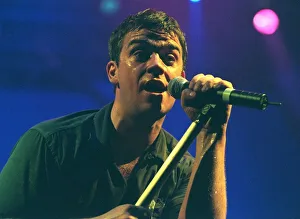Robbie Williams sings at his concert at the SECC Glasgow February 1999 Robbie Williams sings at his concert at the SECC Glasgow February 1999